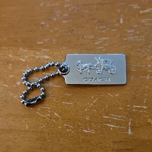 Coach Gold Metal Horse and Carriage hangtag keychain